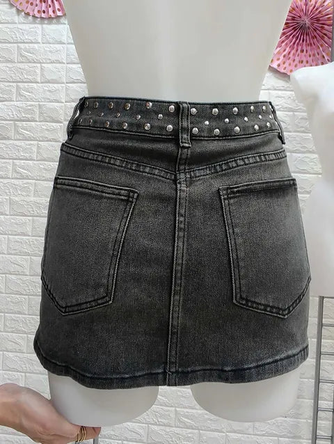 FALDA VAQUERA GRIS TACHUELAS ref. 055